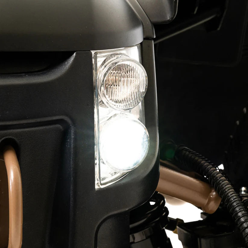 Close-up of the front light assembly on the Pride Mobility Baja Wrangler 2 mobility scooter