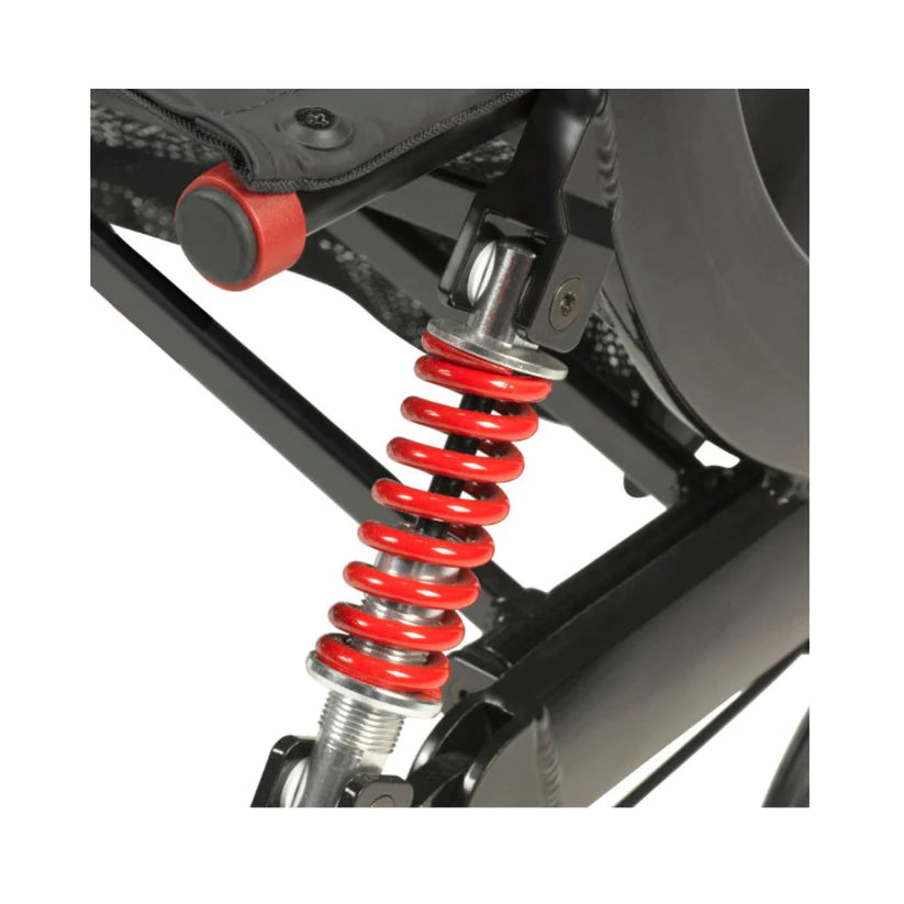 Close-up of red suspension spring on Drive Nitro Euro Style HD Rollator 10266HD-BK wheelchair frame