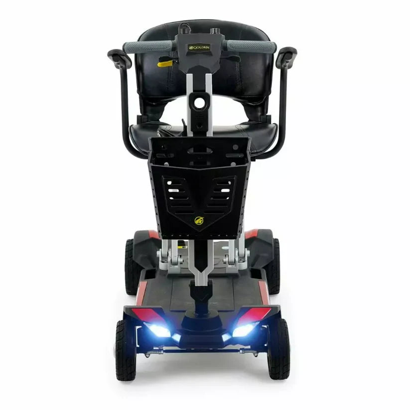 Golden Technologies Buzzaround CarryOn mobility scooter front view with black seat and LED headlights