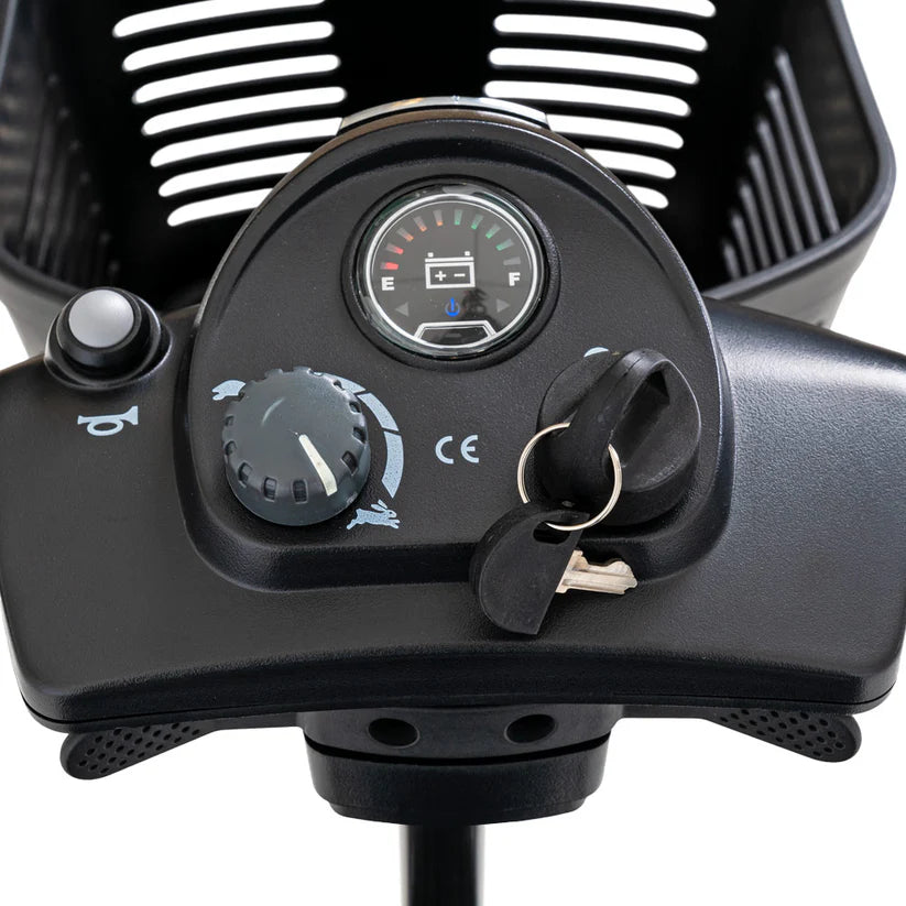 Close-up of the control panel and ignition keys on the Go Go Ultra X 4 Wheel Mobility Scooter by Pride Mobility