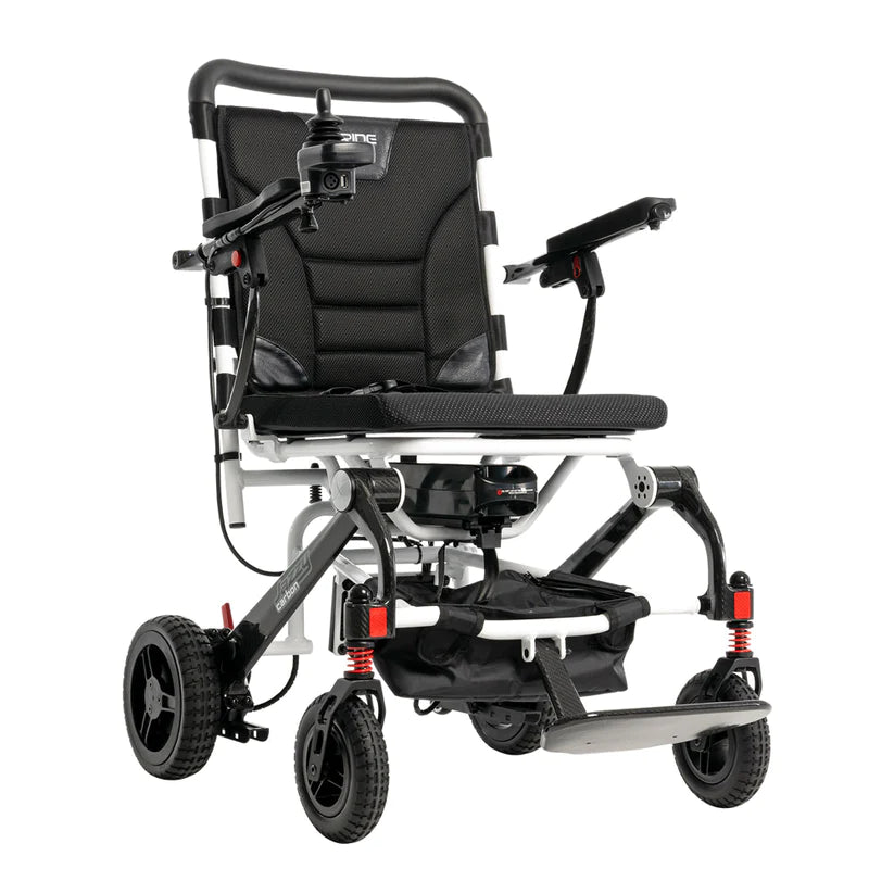 Pride Jazzy Carbon Travel Power Chair lightweight foldable electric wheelchair with black seat and controls