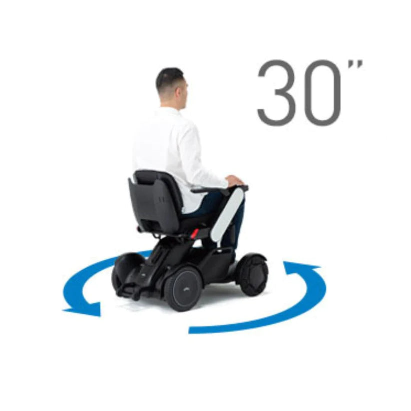 Man demonstrating 30 inch turning radius on WHILL Model C2 Smart Power Chair in white background