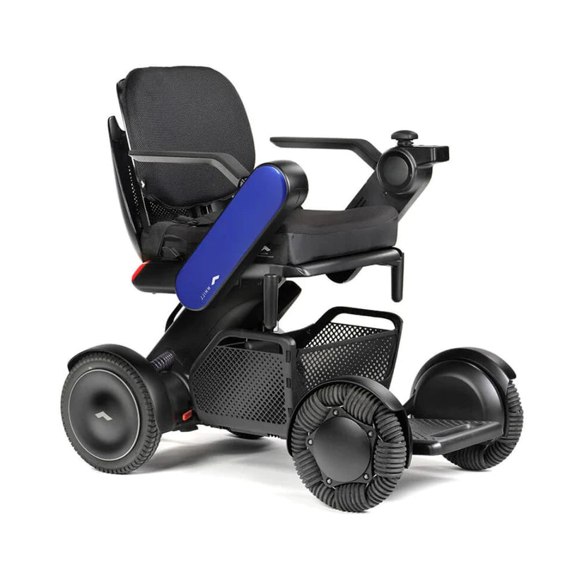 WHILL Model C2 Smart Power Chair with modern design, black and blue frame, all-terrain wheels, and comfortable seat