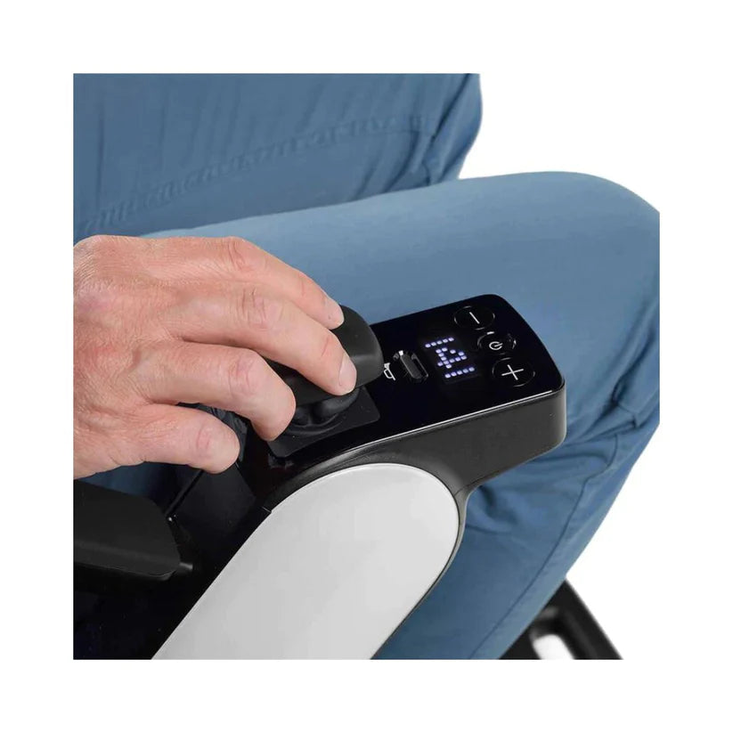 Close-up of hand adjusting joystick control on WHILL Model C2 Smart Power Chair armrest