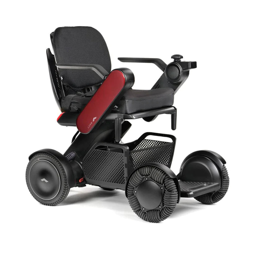 WHILL Model C2 Smart Power Chair with black and red design featuring omni wheels and ergonomic seat