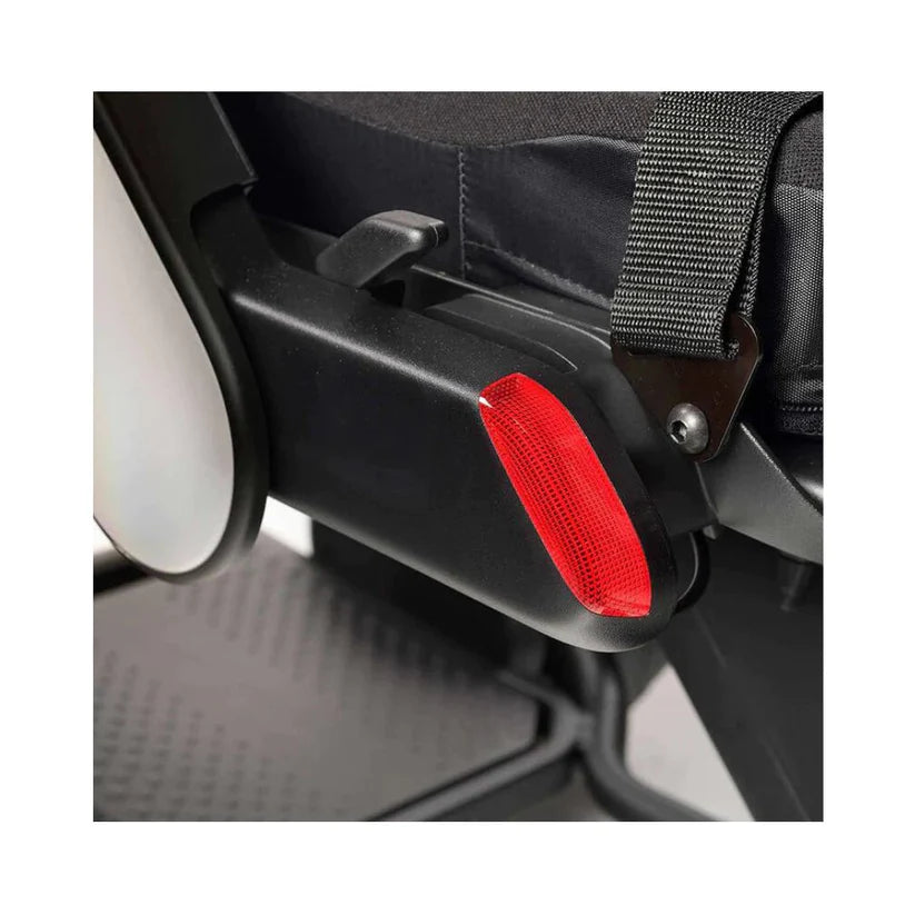 Close-up of rear reflector and safety strap on WHILL Model C2 Smart Power Chair by Whill.inc