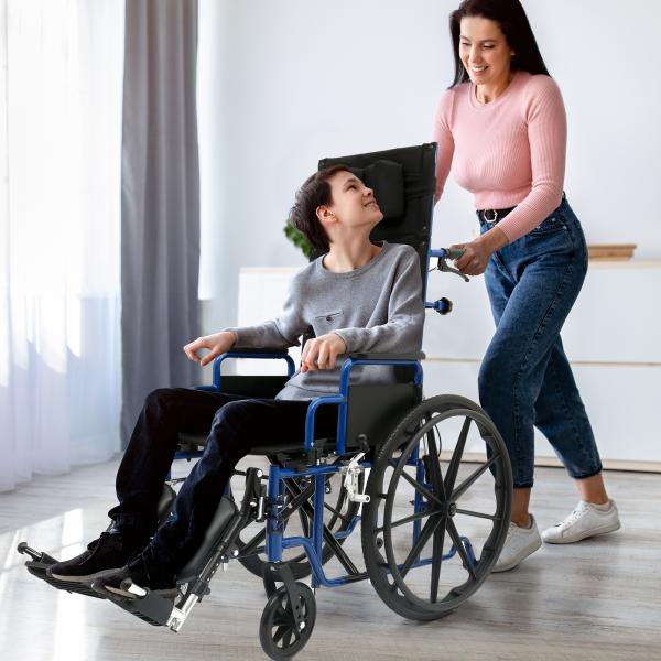 Ziggo Pro Reclining Wheelchair in use with a smiling woman pushing a young boy seated comfortably